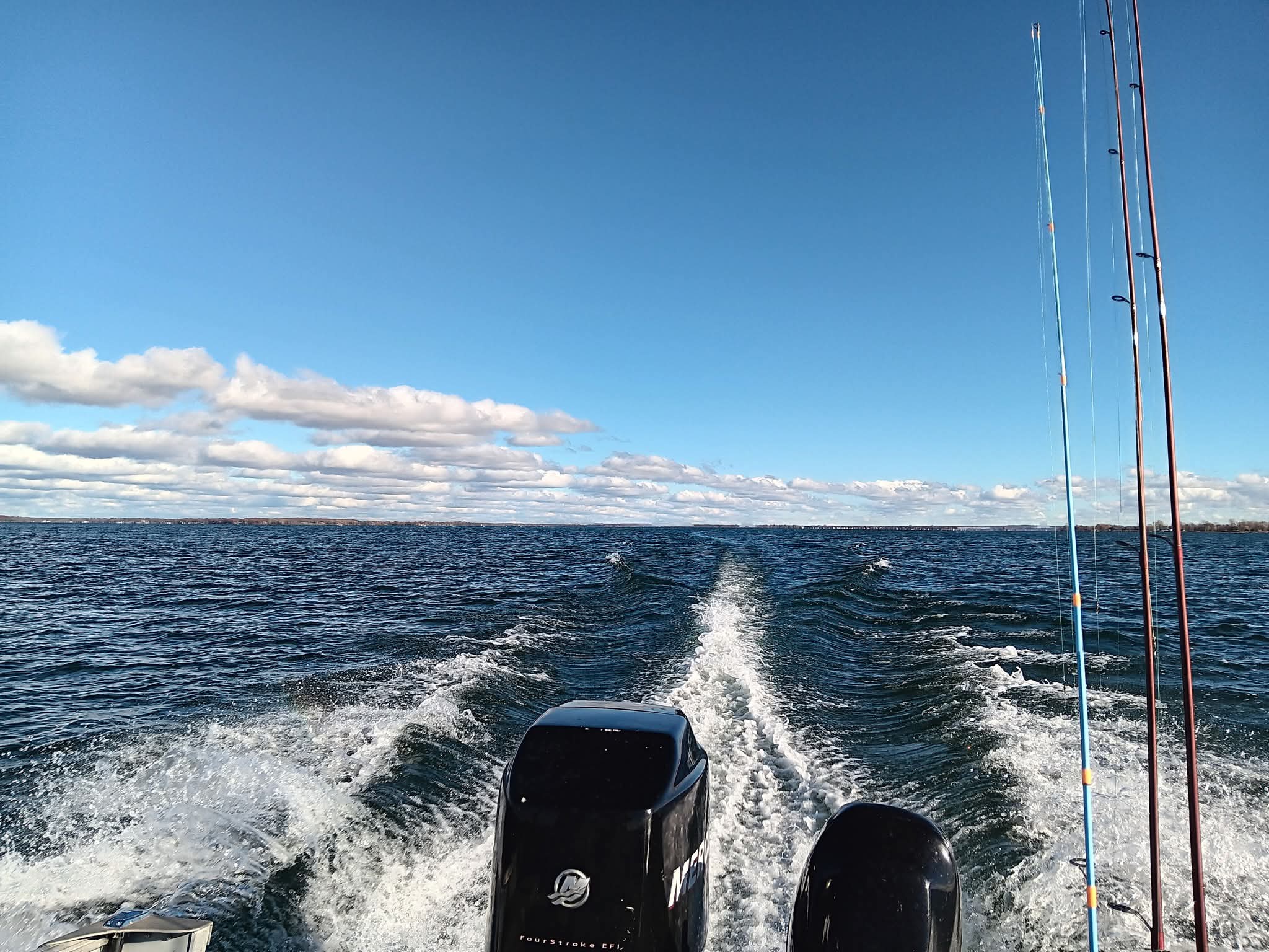 Trolling the open water of the St. Lawrence River on a clear day